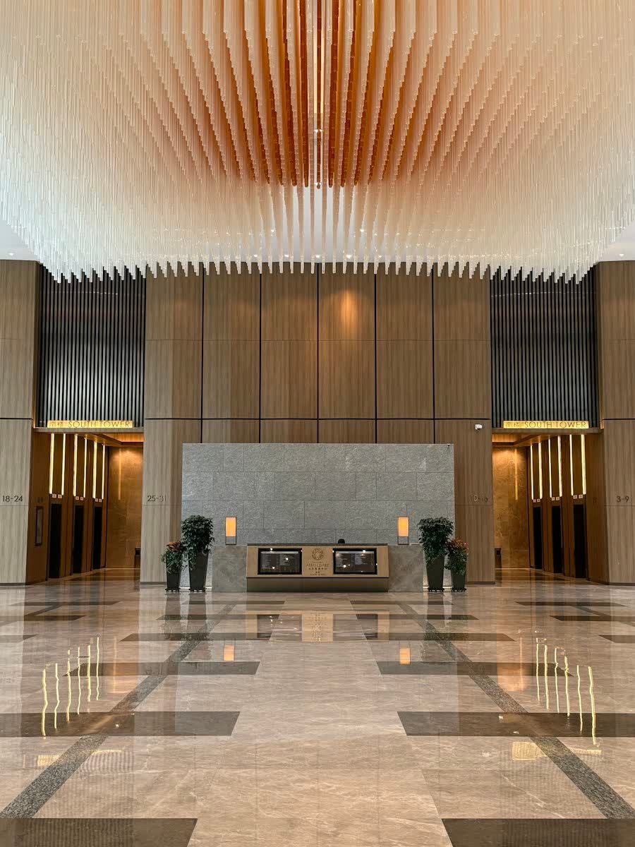 A polished marble lobby with gleaming floors