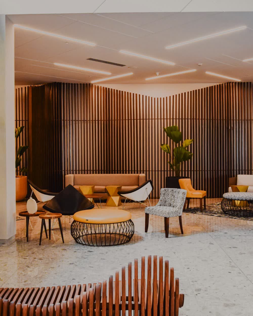 A hotel lobby with lounge seating